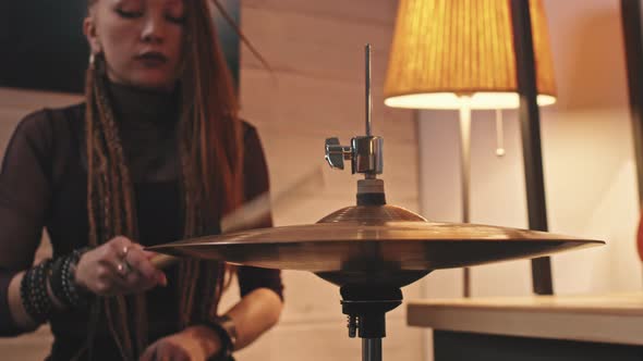 Gothic Woman Playing Drums In Studio