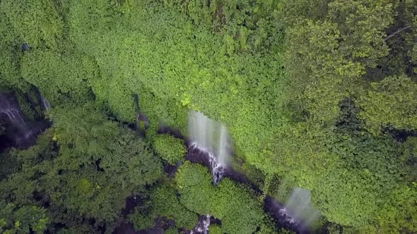 Triple waterfall in the mountain jungle.Beautiful aerial view flight bird's eye view drone footage