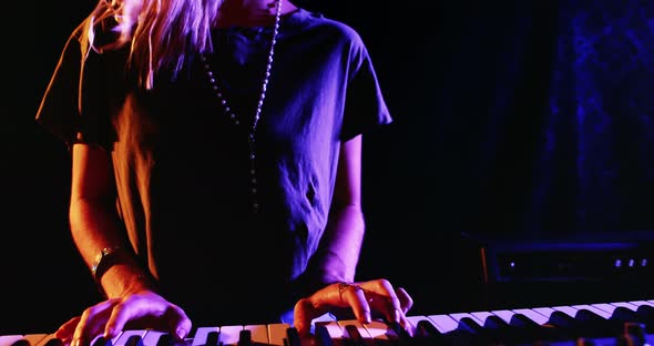 Woman playing electronic keyboard 4k