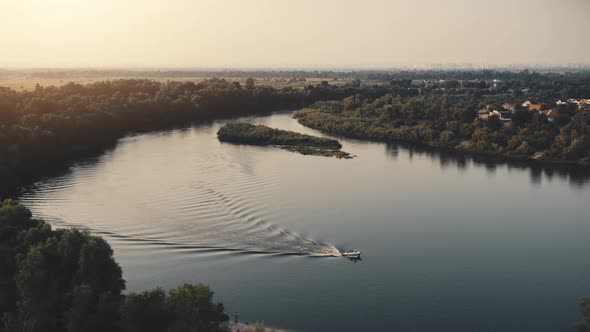 Aerial Sunset Landscape with Boat Sailing River Water alt