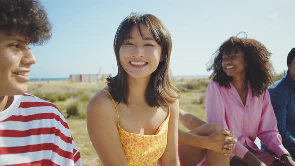 Group of friends having fun on the beach.