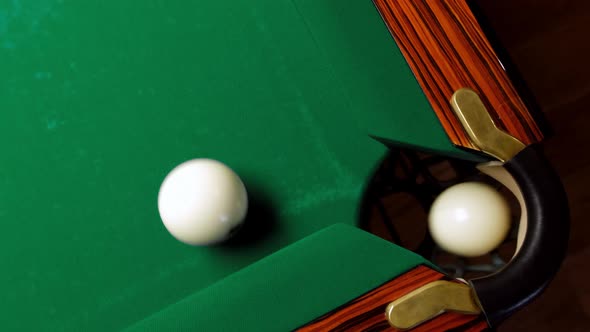 Top Down View of Russian Billiards Rolling Ball Into Side Pocket