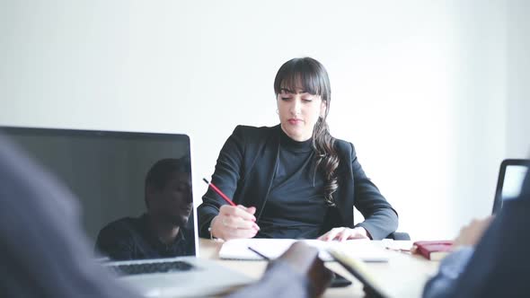 Three business people having a meeting