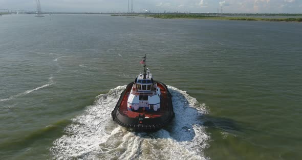 Drone view of tugboat in water