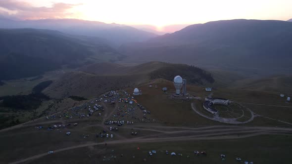 Two Large Telescope Domes at Sunset