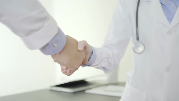 Doctors Shaking Hands