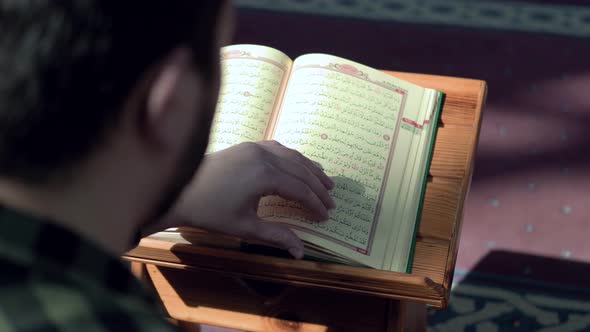 Muslim Young Man Reading Quran Mosque