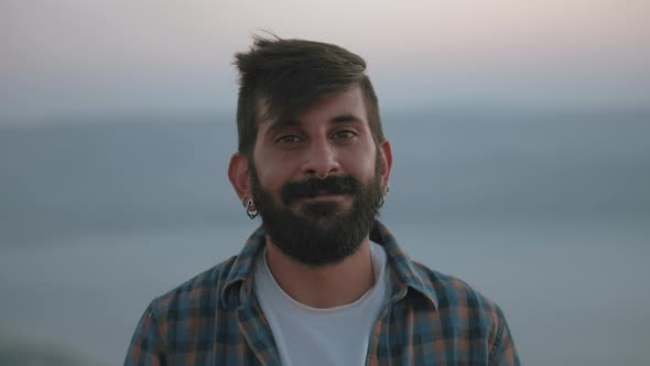 Middle eastern man smiling to the camera