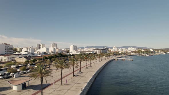 Embankment or esplanade along waterfront in Portimao, Portugal