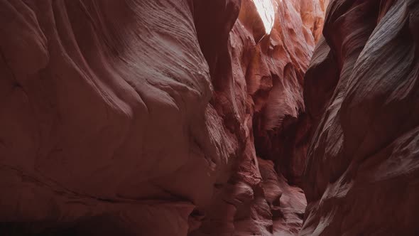 Picturesque Deep Slot Canyon With Wavy And Smooth Orange Red Stone Rock Walls