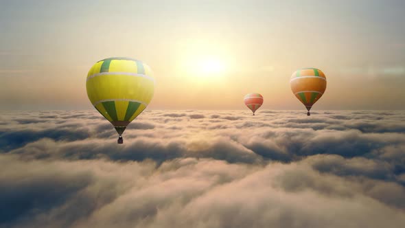 Aerial View Balloon Flying at Sunset Over the Clouds. Balloon Flight Above the Clouds. The Sun's