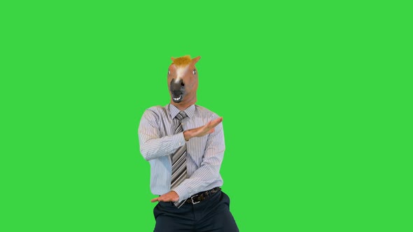 Business Man in a Horse Mask Dancing on a Green Screen Chroma Key