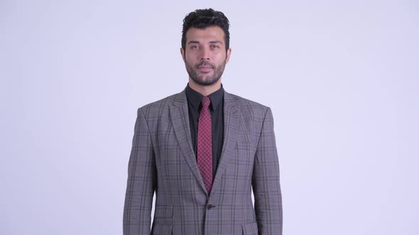 Handsome Bearded Persian Businessman Wearing Suit