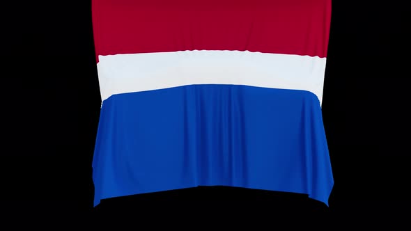 The piece of cloth falls with the flag of the State of Netherlands to cover the product