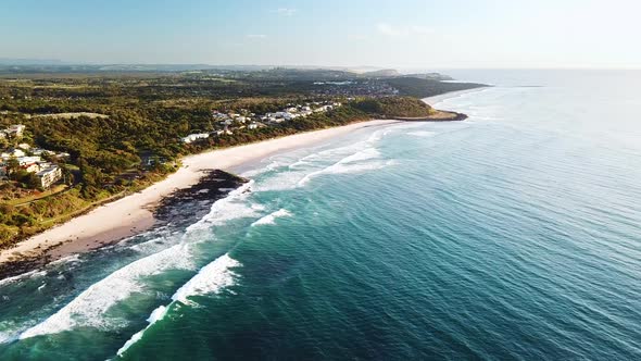 Drone footage on clear sunny morning of Shelly Beach, Ballina, Australia.