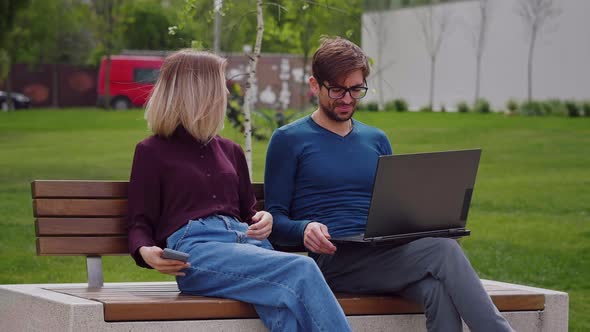 Business colleagues friends greeting each other with Fist-Bumps outdoors