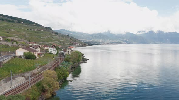 Jib down of beautiful lake in Swiss countryside