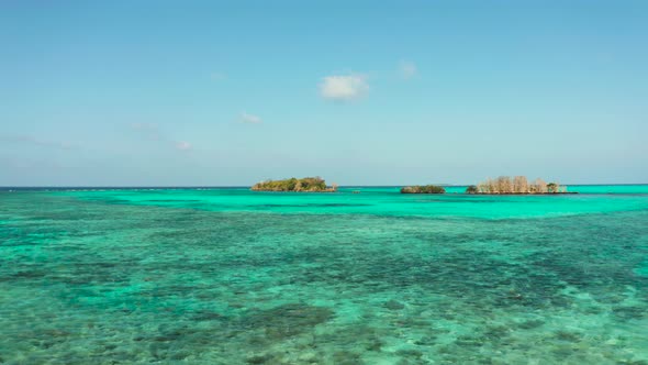 Tropical Islands and Coral Reef Atoll