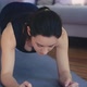 Calm Woman Does Plank Exercise in Living Room Closeup - VideoHive Item for Sale