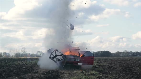 Car Explosion. Car Blasts Into the Field. Slow Motion