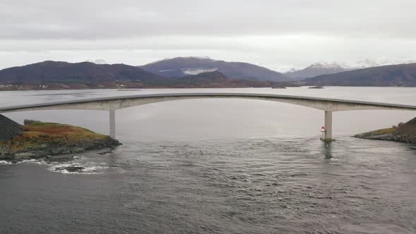 Most Iconic Storseisundet Bridge Of The Atlantic Road (Atlanterhavsveien) In Norway. Aerial Pullback