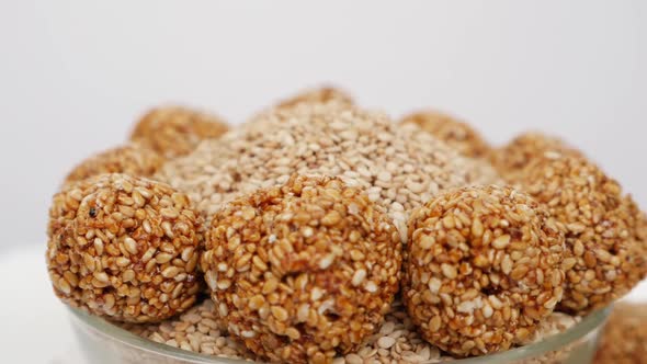 Sesame ladoos filled in a bowl, Micro shot of sesame seeds in a bowl