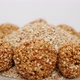 Sesame ladoos filled in a bowl, Micro shot of sesame seeds in a bowl - VideoHive Item for Sale