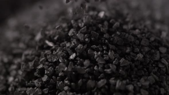 A pile of Hawaiian lava salt. Slow Motion.