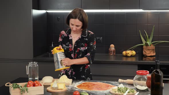 Cooking at home. Young woman preparing homemade food in modern kitchen