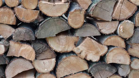 Spruce wood in the background. Firewood stack.