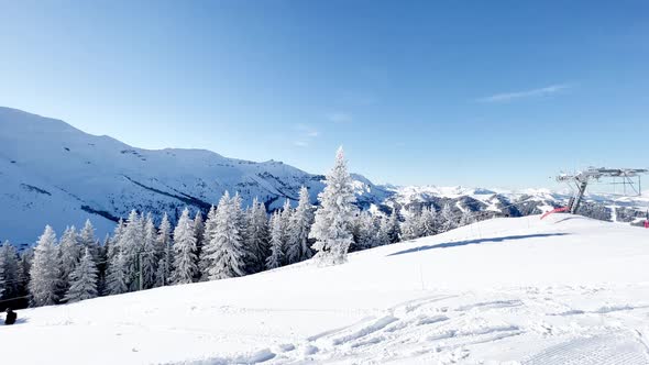 Ski Lift Station and Beautiful White Snow Covered Fir Forest