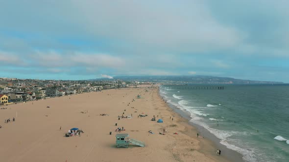 Aerial View Of Scenic Seascape And hermosa beach Pier During Summer - drone shot