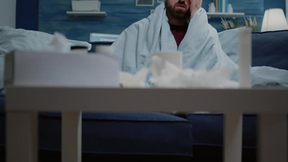 Close Up of Man with Headache Holding Head and Feeling