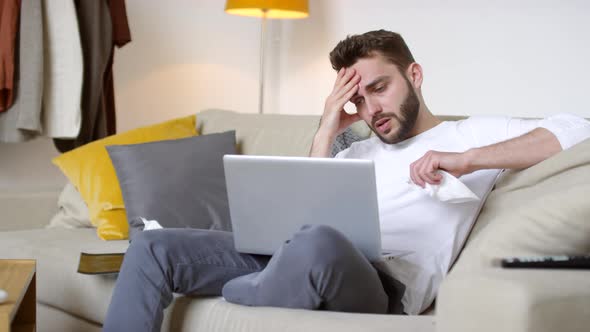 Sick Man with Cough Talking on Video Call