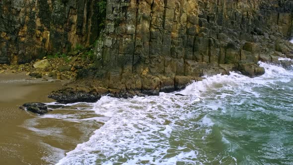 Waves Beating Basalt Lava Columns