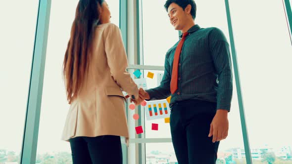 Business People Handshake in Corporate Office