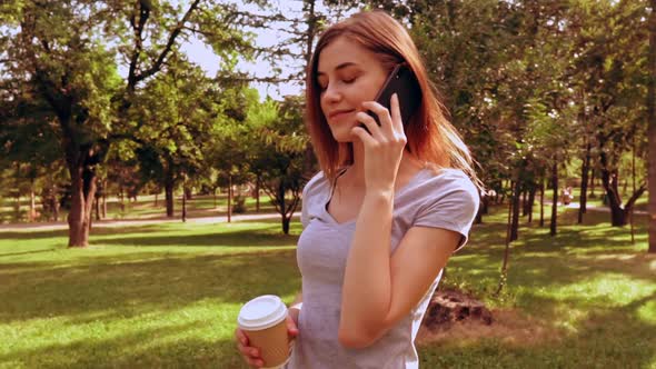 Caucasian Lady Has Phone Conversation Outdoor