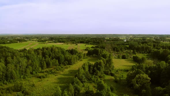 Meadows and Forests in the light of the setting Sun