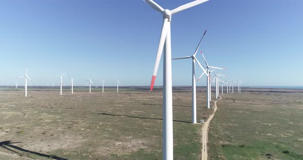 Windmills farm. Modern wind turbines