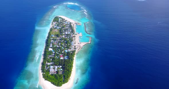 Wide angle birds eye clean view of a summer white paradise sand beach and turquoise sea background i