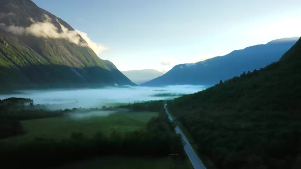 Morning Mist Over the Valley Among the Mountains in the Sunlight