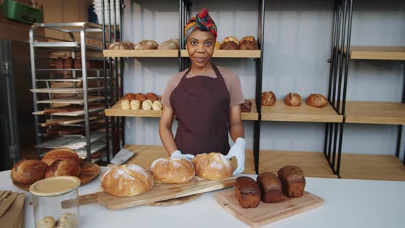 Portrait of Happy Afro-American Female Baker at Work