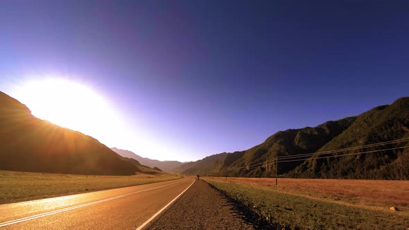 Mountain Road Timelapse at the Summer or Autumn Sunset Sunrise Time