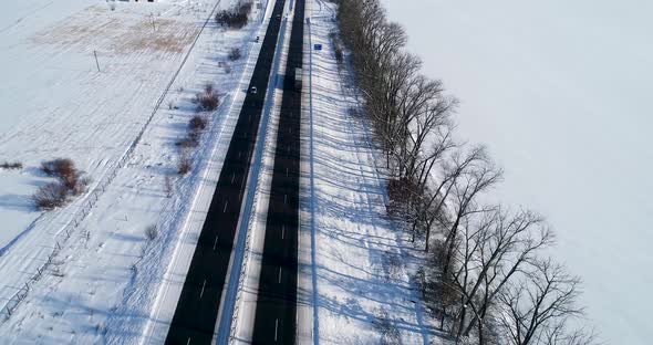 Aerial View of the Snow Road in Winter