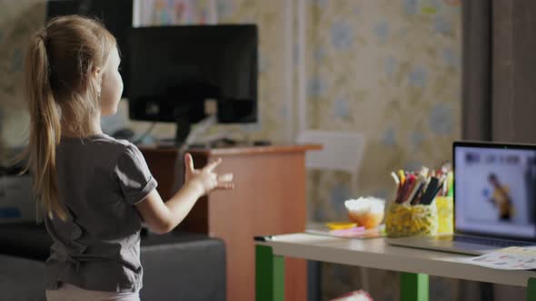 Little Girl Learning Remotely While School Is Closed