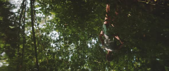 Reflection of man on water