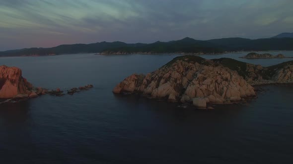 View From a Drone To a Beautiful Island in the Triozerie Bay at Sunrise