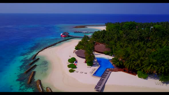 Aerial drone shot travel of idyllic bay beach time by shallow ocean with bright sandy background of 