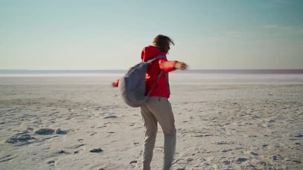 Slow Motion Free Happy Young Hiker Woman in Red Jacket Laughing and Whirling with Raised Arms