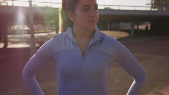 Caucasian woman standing alone in a park